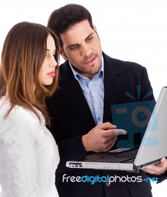 Business People Discussing With Laptop Stock Photo