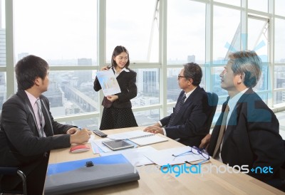 Business People Report Meeting In Office Stock Photo