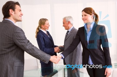 Business People Shaking Hands Stock Photo