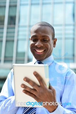 Business Professional Using A Tablet Pc Stock Photo