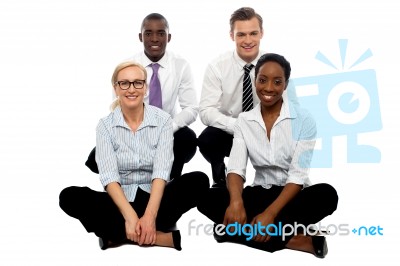 Business Team Sitting On Floor Stock Photo