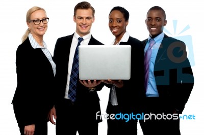 Business Team Using Laptop Stock Photo