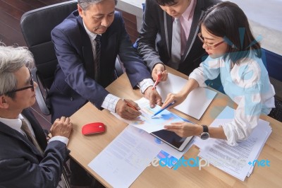 Business  Team Work Asian People Report Analysis  Meeting Discussing Project Planing Shot Over Office Working Table Stock Photo