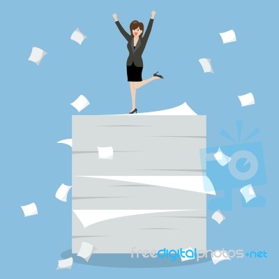 Business Woman Celebrating On A Lot Of Documents Stock Image