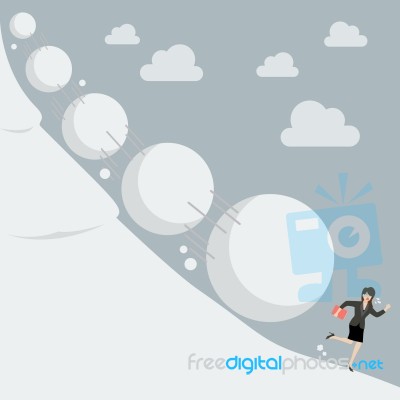 Business Woman Running Away From Snowball Effect Stock Image