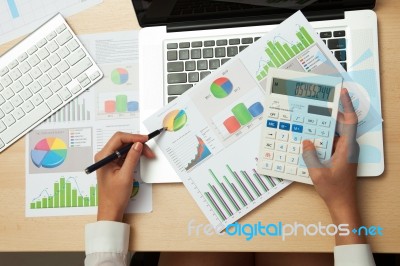 Business Women With Calculator Stock Photo