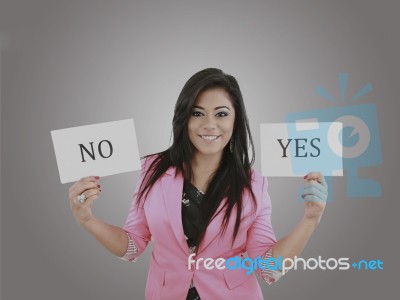 Business Young Woman Trying To Make A Decision Between Yes Or No… Stock Photo