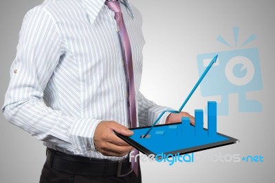 Businessman And Chart. Stock Photo