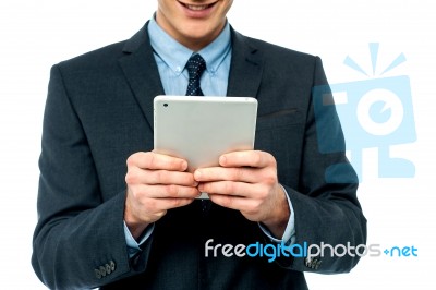 Businessman Browsing On Tablet Pc Stock Photo