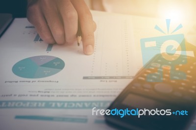 Businessman Calculate Cost And Expenses Using Laptop For Search Stock Photo