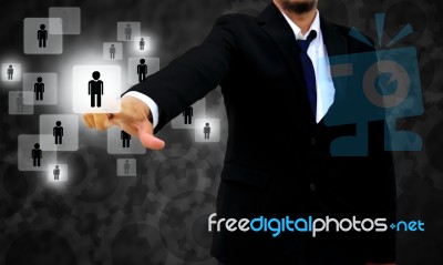 Businessman Choosing The Right Person Stock Photo