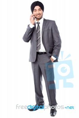 Businessman Communicating With Client Stock Photo