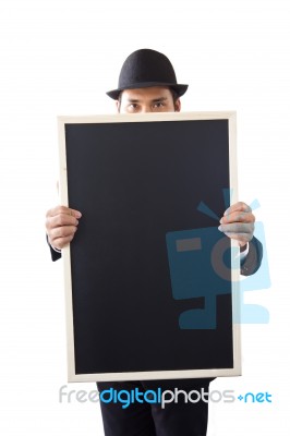 Businessman Holding A Blackboard Stock Photo