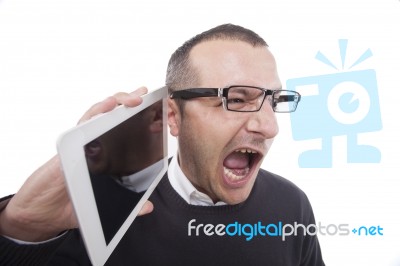 Businessman Holding A Table  And Screaming Stock Photo