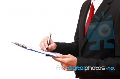 Businessman Holding Clipboard Stock Photo
