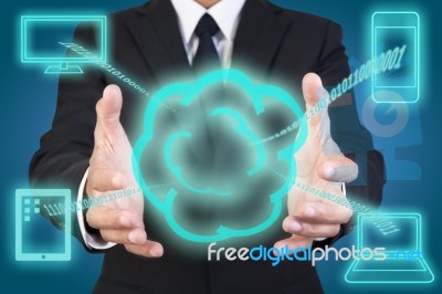 Businessman Holding Cloud Computing Stock Photo