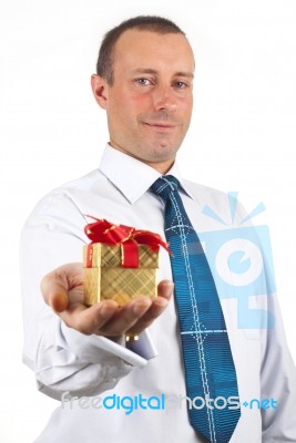 Businessman Holding Gift Box Stock Photo