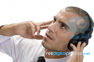 Businessman Holding Headphone Stock Photo