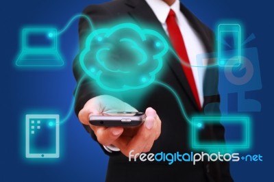 Businessman Holding Smart Phone Stock Photo