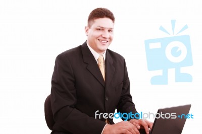 Businessman In Front Of Laptop Stock Photo