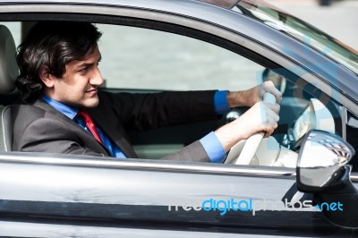 Businessman In His Car Stock Photo