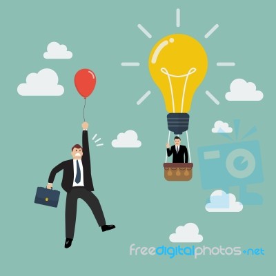 Businessman In Lightbulb Balloon Fly Pass Businessman With Red B… Stock Image