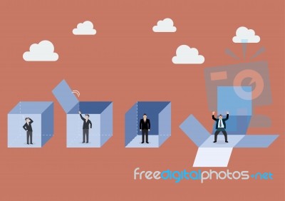 Businessman Is Getting Out Of The Box Stock Image