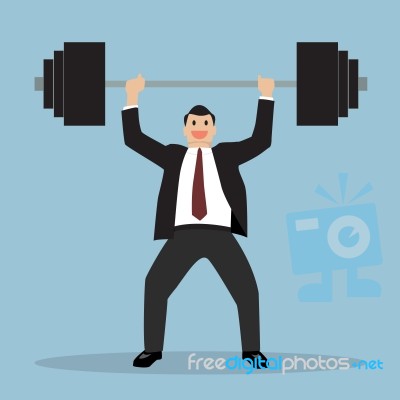Businessman Lifting A Heavy Weight Stock Image