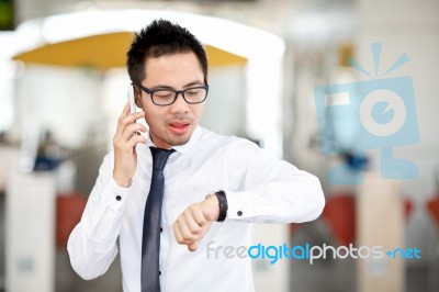 Businessman Look His Watch Stock Photo