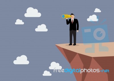 Businessman Looking For Business Future On The Cliff Stock Image