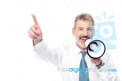 Businessman Making An Announcement By Loudhailer Stock Photo
