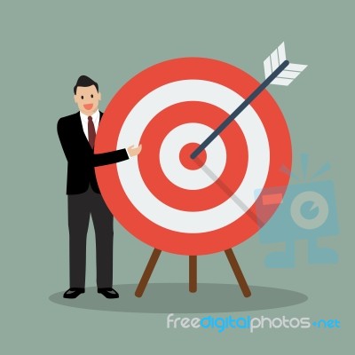 Businessman Pointing To The Big Target Stock Image