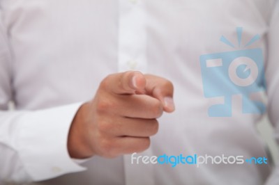 Businessman Pointing With His Finger Stock Photo