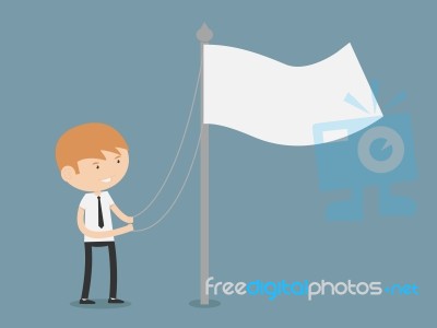 Businessman Raising A Flag Stock Image