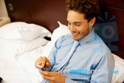 Businessman Reading Sms Stock Photo