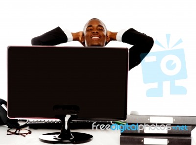 Businessman Relaxing With Computer Stock Photo