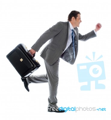 Businessman Running Stock Photo