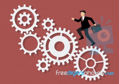 Businessman Running On Mechanism System Stock Image
