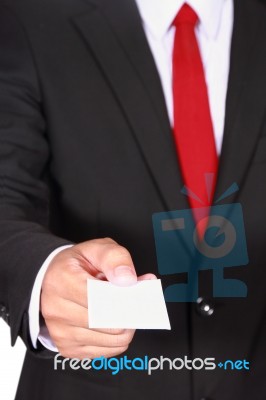 Businessman Showing Blank Card Stock Photo