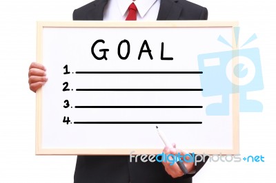 Businessman Showing Idea On White Board Stock Photo