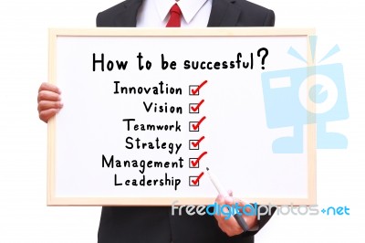 Businessman Showing Idea On White Board Stock Photo