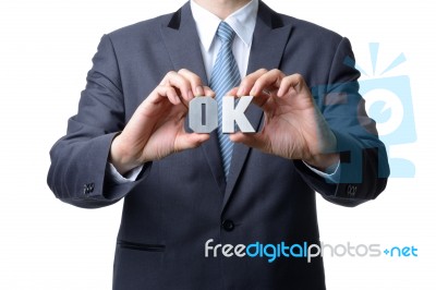 Businessman Showing Ok Sign Stock Photo