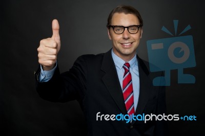 Businessman Showing Thumbs Up Stock Photo