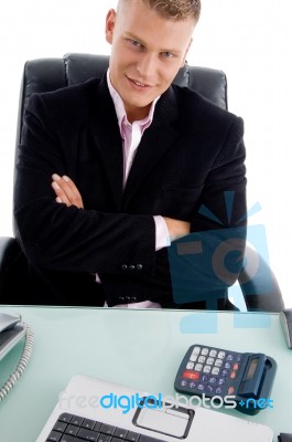 Businessman sitting At Desk Stock Photo
