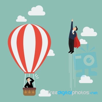 Businessman Superhero Fly Pass Businessman In Hot Air Balloon Stock Image