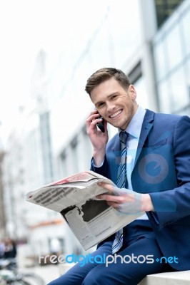 Businessman Talking On The Mobile Phone Stock Photo