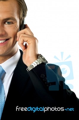 Businessman Talking Over Mobile Stock Photo