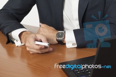 Businessman Texting Stock Photo