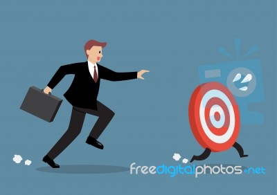 Businessman Try To Catch The Target Stock Image