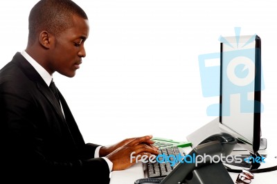 Businessman Typing On Computer Stock Photo